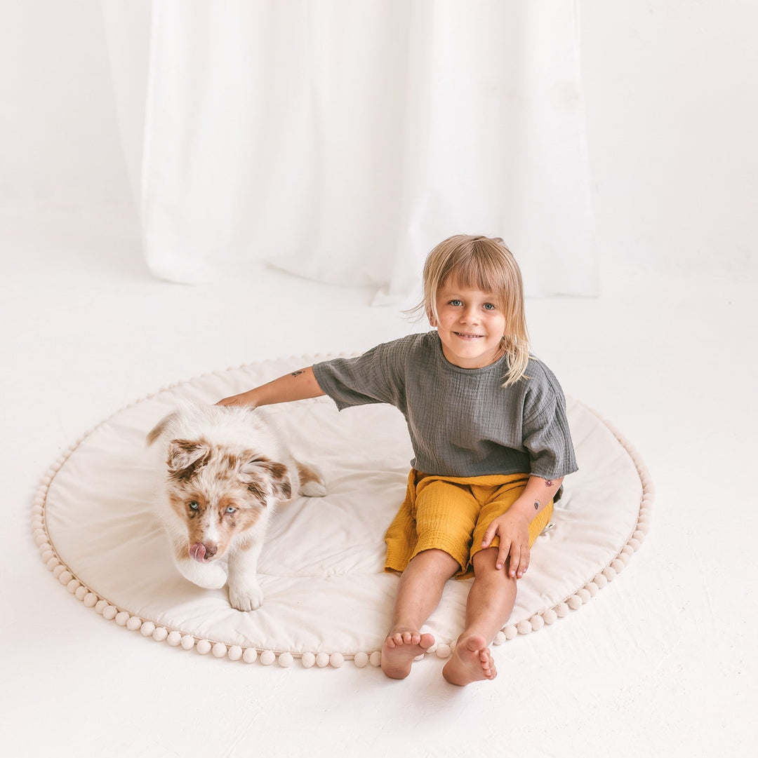 Speelmat voor kinderen met pompomranding